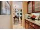 Bright breakfast nook offers natural light and views into a lush green space at 2872 Sumter Valley Cir, Henderson, NV 89052