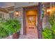Grand front entryway featuring a decorative wrought iron door and stone accents at 2872 Sumter Valley Cir, Henderson, NV 89052