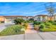 Charming single story home with a well-manicured lawn and covered three car garage at 2872 Sumter Valley Cir, Henderson, NV 89052