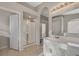Bathroom with glass-enclosed shower and sink with white countertop at 3417 Steppe St, North Las Vegas, NV 89032
