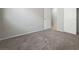 Bedroom featuring neutral carpet and grey walls at 3417 Steppe St, North Las Vegas, NV 89032