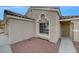 Close up view of a single story home entrance with desert landscaping and a security door at 3417 Steppe St, North Las Vegas, NV 89032