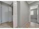 Hallway with tile flooring, closet and doors leading to other rooms at 3417 Steppe St, North Las Vegas, NV 89032