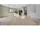 Spacious kitchen with white cabinets, black appliances, and center island at 3417 Steppe St, North Las Vegas, NV 89032