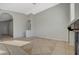 Open living room with fireplace and tile flooring at 3417 Steppe St, North Las Vegas, NV 89032