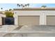 Attached garage with ample parking space, providing convenience and security at 353 Seine Way # 0, Henderson, NV 89014