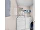 The laundry room includes a white washer and dryer set with a window at 353 Seine Way # 0, Henderson, NV 89014