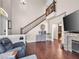 Spacious living room featuring a fireplace and an open floor plan at 353 Seine Way # 0, Henderson, NV 89014