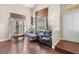 Comfortable living room with a vaulted ceiling and ample seating at 353 Seine Way # 0, Henderson, NV 89014