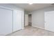 Neutral bedroom featuring light wood floors and a closet with modern sliding doors at 4213 Hayes Pl, Las Vegas, NV 89107