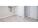 Bedroom with light wood floors, built-in closet, neutral walls, and natural light at 4213 Hayes Pl, Las Vegas, NV 89107