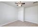 This clean bedroom features laminate floors, a ceiling fan and closet at 4213 Hayes Pl, Las Vegas, NV 89107