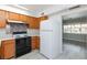 Clean kitchen with light wood cabinets, quartz countertops and stainless steel appliances at 4213 Hayes Pl, Las Vegas, NV 89107