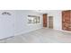 Bright, open living room with wood floors and brick columns at 4213 Hayes Pl, Las Vegas, NV 89107