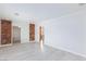 Bright, open living room with wood floors and brick accents at 4213 Hayes Pl, Las Vegas, NV 89107