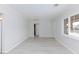 Bright living room features fresh paint, modern baseboards and durable wood-look laminate flooring at 4213 Hayes Pl, Las Vegas, NV 89107