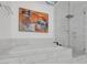 Modern bathroom features a soaking tub and a glass-enclosed shower with sleek fixtures and marble-like tiling at 4471 Dean Martin Dr # 1202, Las Vegas, NV 89103