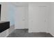 Clean bedroom with an open doorway to another room and a large closet with minimalist doors at 4471 Dean Martin Dr # 1202, Las Vegas, NV 89103