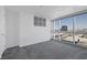 Bedroom featuring carpeting, natural light, and an expansive city view at 4471 Dean Martin Dr # 1202, Las Vegas, NV 89103