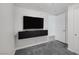 Bedroom showcasing a floating TV console and an open doorway leading to another room at 4471 Dean Martin Dr # 1202, Las Vegas, NV 89103