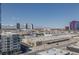Wide shot of the cityscape showing a variety of buildings, mountains, and industrial rooftops at 4471 Dean Martin Dr # 1202, Las Vegas, NV 89103