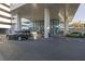 Upscale building entrance showcasing valet parking and modern architecture at 4471 Dean Martin Dr # 1202, Las Vegas, NV 89103