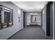 Elevator hallway entrance featuring gray tones, overhead lighting, and art installation at 4471 Dean Martin Dr # 1202, Las Vegas, NV 89103