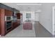 Spacious kitchen with center island, tile backsplash, and stainless appliances at 4471 Dean Martin Dr # 1202, Las Vegas, NV 89103