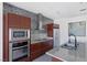 Close up of modern kitchen featuring sleek cabinetry and backsplash at 4471 Dean Martin Dr # 1202, Las Vegas, NV 89103