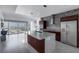 Modern kitchen boasts stainless appliances, an island, and stunning city views at 4471 Dean Martin Dr # 1202, Las Vegas, NV 89103
