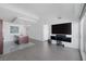 Living room and kitchen with modern design and open space at 4471 Dean Martin Dr # 1202, Las Vegas, NV 89103