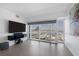 Bright living room with floor to ceiling windows offers views of the city at 4471 Dean Martin Dr # 1202, Las Vegas, NV 89103