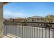 Balcony view overlooking neighboring homes and street at 470 Dorchester Bend Ave # 3, North Las Vegas, NV 89032