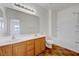 Well-lit bathroom features double sinks, spacious vanity, tile floor and a tub with shower at 470 Dorchester Bend Ave # 3, North Las Vegas, NV 89032
