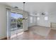 Bright dining area with sliding glass doors to balcony, perfect for enjoying outdoor views at 470 Dorchester Bend Ave # 3, North Las Vegas, NV 89032