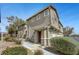 Charming two-story townhome featuring a well-maintained front yard and inviting entrance at 470 Dorchester Bend Ave # 3, North Las Vegas, NV 89032