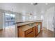 Kitchen area featuring bar, stainless steel appliances, and easy access to balcony at 470 Dorchester Bend Ave # 3, North Las Vegas, NV 89032