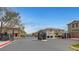 Street view of the community featuring townhomes and gated access at 470 Dorchester Bend Ave # 3, North Las Vegas, NV 89032