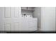 Practical laundry room with white washer and dryer, maximizing space efficiency at 474 Ylang Pl # Lot 7, Henderson, NV 89015