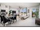 Bright living room with tile floors, modern furniture, and a view of the mountains at 474 Ylang Pl # Lot 7, Henderson, NV 89015