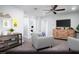 Cozy loft area with comfortable seating, a ceiling fan, and ample lighting at 474 Ylang Pl # Lot 7, Henderson, NV 89015
