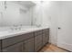 Bathroom featuring double sink vanity, white counter top, wood-look flooring at 477 Highview Ridge Ave, Las Vegas, NV 89138