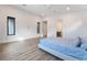 Bright bedroom with wood floors features a ceiling fan, recessed lighting, and natural light at 477 Highview Ridge Ave, Las Vegas, NV 89138