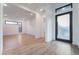 Bright entryway with wood floors, black trim windows and door at 477 Highview Ridge Ave, Las Vegas, NV 89138