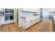 Kitchen boasts stainless steel appliances, white cabinetry, and stone countertops at 477 Highview Ridge Ave, Las Vegas, NV 89138