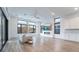 Living room features sleek fan, fireplace, and direct access to outdoor living space at 477 Highview Ridge Ave, Las Vegas, NV 89138
