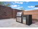 Outdoor kitchen features a built-in grill, stainless steel refrigerator and marble counter, perfect for entertaining at 477 Highview Ridge Ave, Las Vegas, NV 89138