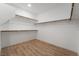 The walk-in closet has wood floors and built-in shelves at 477 Highview Ridge Ave, Las Vegas, NV 89138