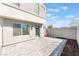 Backyard featuring a patio area with gray brick pavers and a privacy wall at 4915 Chidlaw Ave # 2, Las Vegas, NV 89115