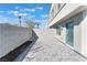 Private backyard with light gray brick pavers and block wall for outdoor relaxation at 4915 Chidlaw Ave # 2, Las Vegas, NV 89115